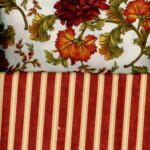 Two fabric patterns: one with red and orange floral design, the other with red and white vertical stripes.
