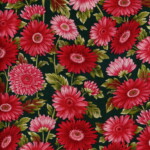 A vibrant floral pattern featuring red and pink gerbera daisies with green leaves on a dark background.