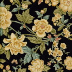 Floral pattern with yellow and peach flowers, green leaves, and a bird on a black background.