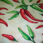 Fabric pattern featuring red and green chili peppers on a beige background.
